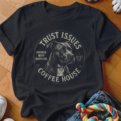 Black t-shirt with "Trust Issues Coffee House Brewed With Suspicion" text and dog graphic.
