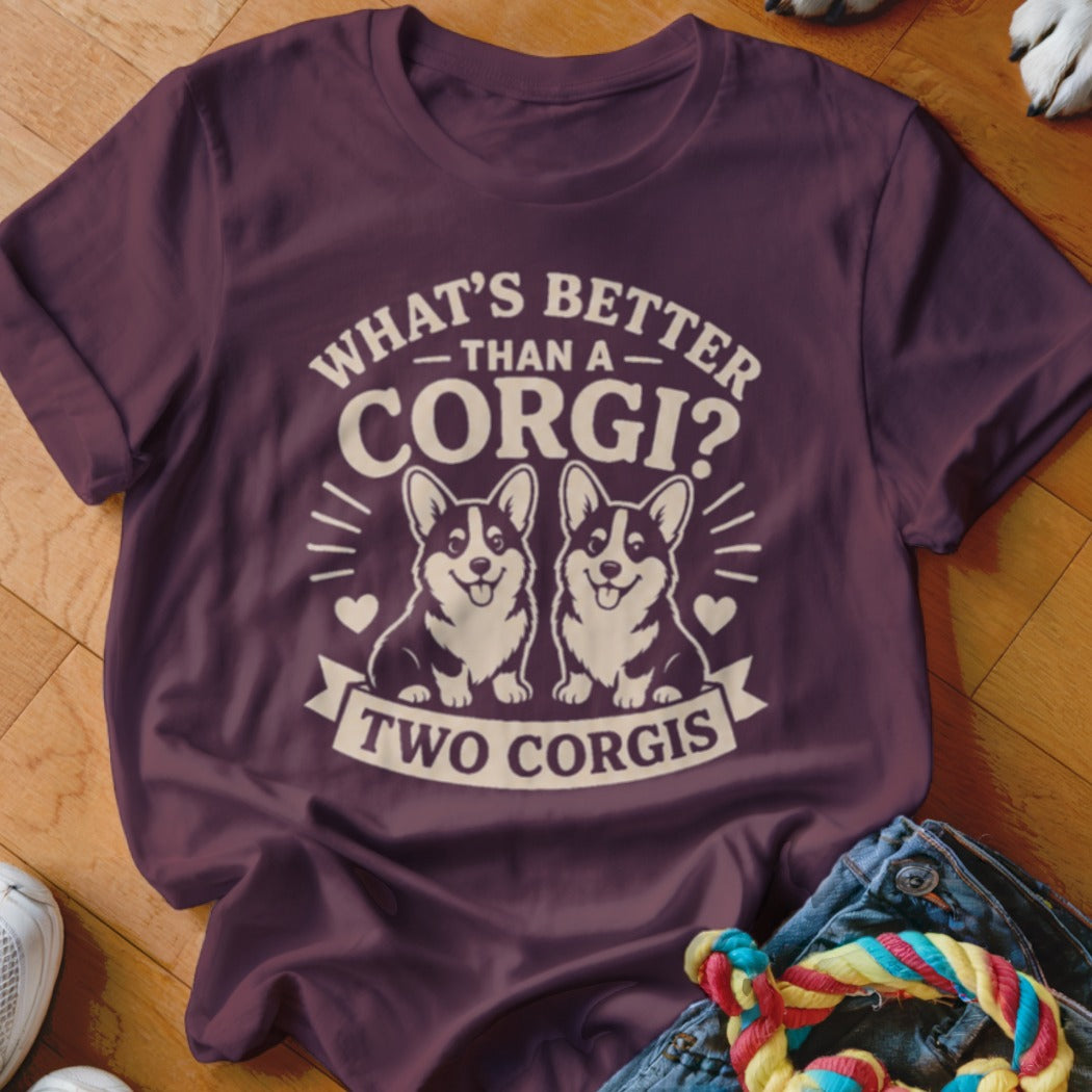 T-shirt with graphic of two smiling corgis and text "What's better than a corgi? Two corgis."