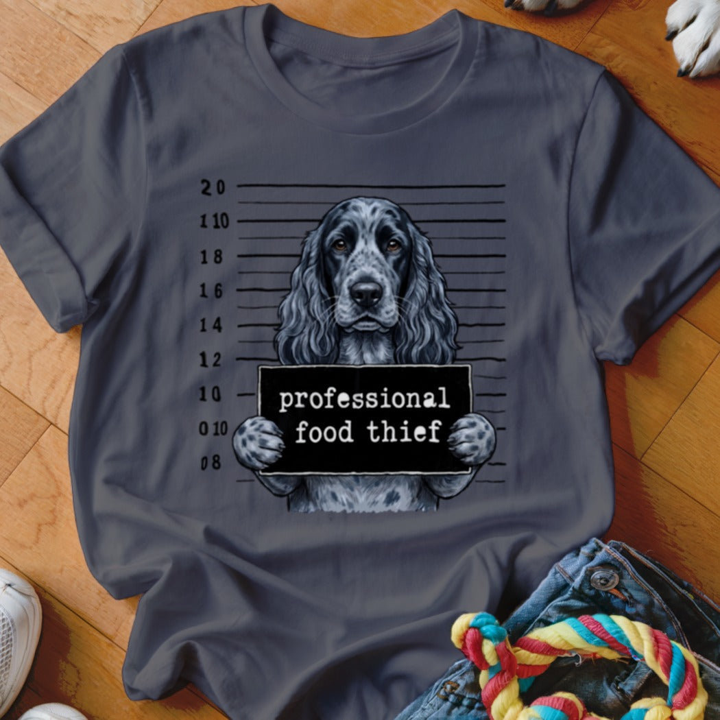 Dark gray t-shirt with a dog mugshot graphic and the text "professional food thief".