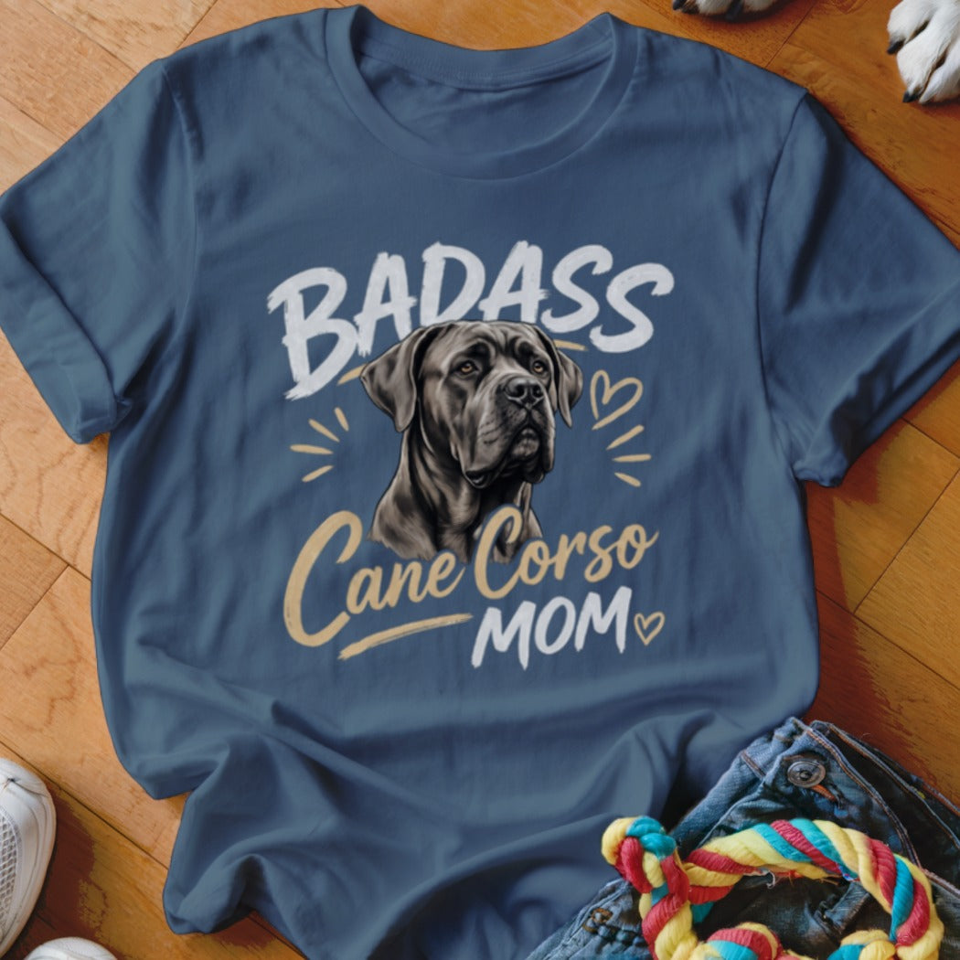 A dark blue t-shirt printed with a Cane Corso graphic and text reading Badass Cane Corso Mom.
