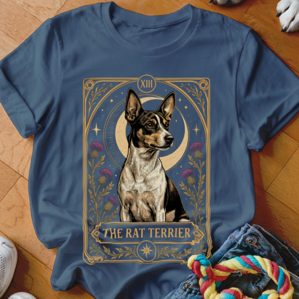 Blue crewneck t-shirt featuring a tarot card style graphic of a rat terrier with purple thistles and a crescent moon.