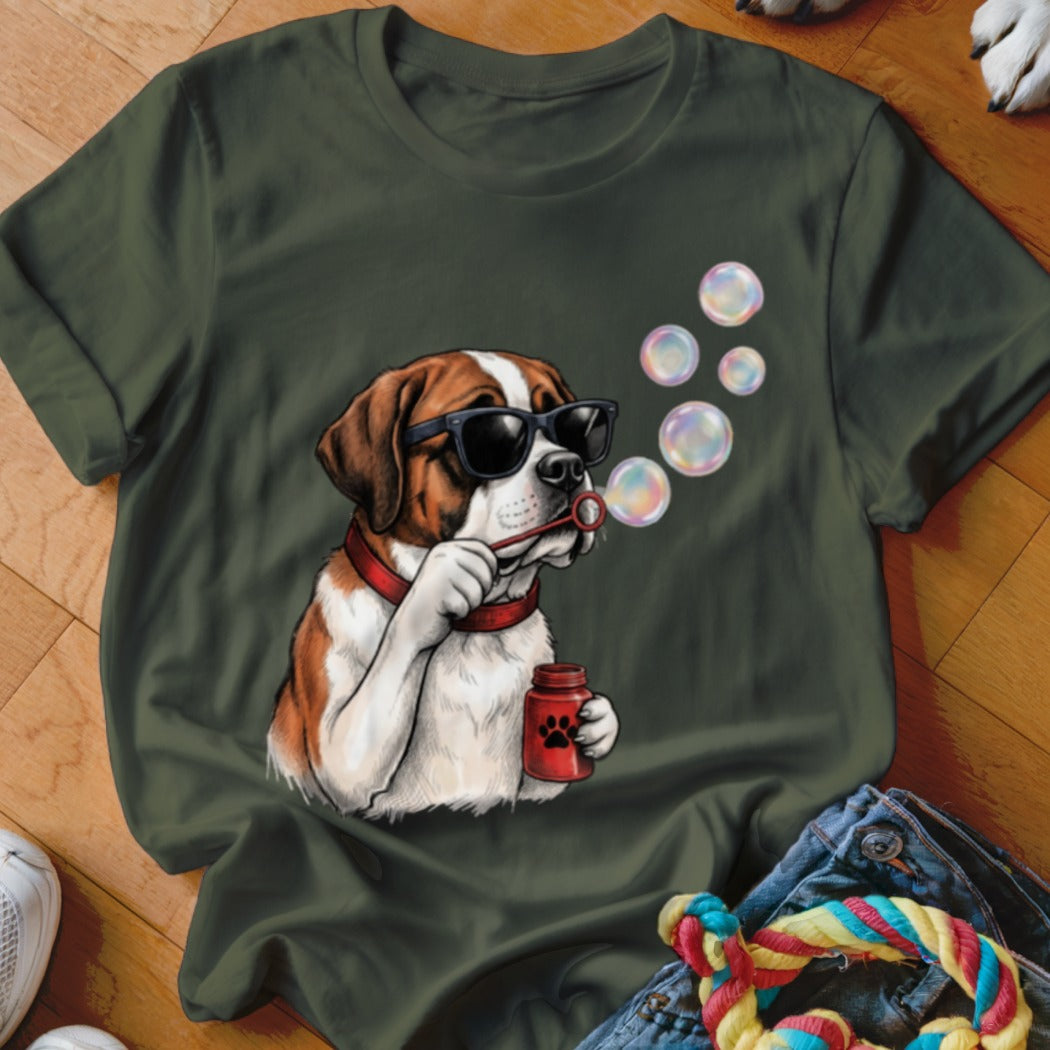 Dark green t-shirt featuring a graphic of a Saint Bernard dog wearing sunglasses and blowing soap bubbles.