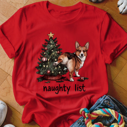 Red t-shirt with a corgi by a Christmas tree, text reads "naughty list".