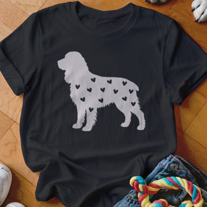 Black t-shirt with white silhouette of a dog covered in small black hearts.