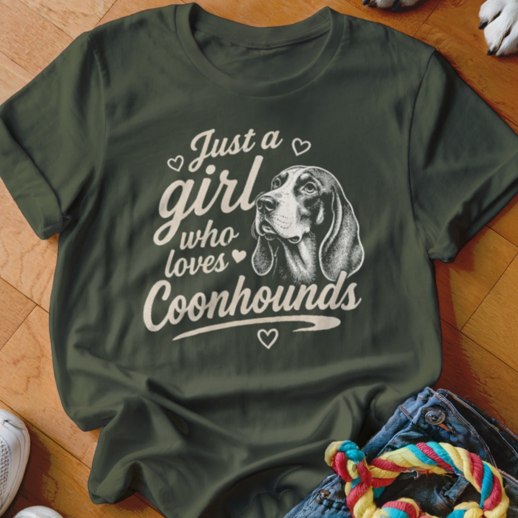 Dark green t-shirt with "Just a girl who loves Coonhounds" and a raccoon dog.