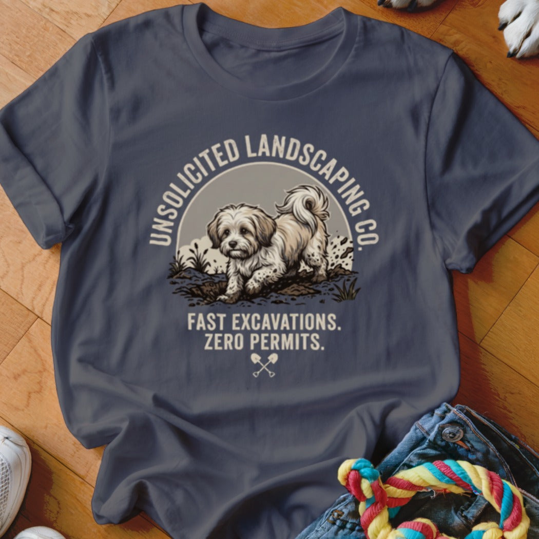 T-shirt graphic with a dog digging, "Unsolicited Landscaping Co.", and "Fast Excavations. Zero Permits."