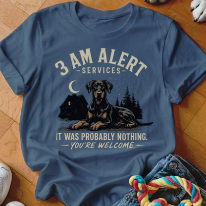 T-shirt graphic: Doberman dog lying down, house, trees, moon, and text "3 AM ALERT SERVICES" and "IT WAS PROBABLY NOTHING. YOU'RE WELCOME."