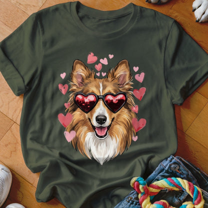 Dark green t-shirt featuring an illustration of a dog wearing heart-shaped sunglasses, surrounded by pink hearts.