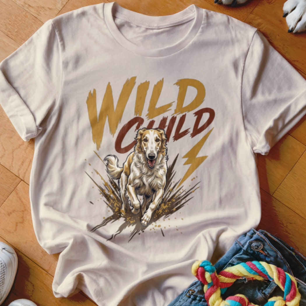 Off-white crewneck t-shirt featuring a graphic of a running dog, mud splatters, and the text Wild Child.