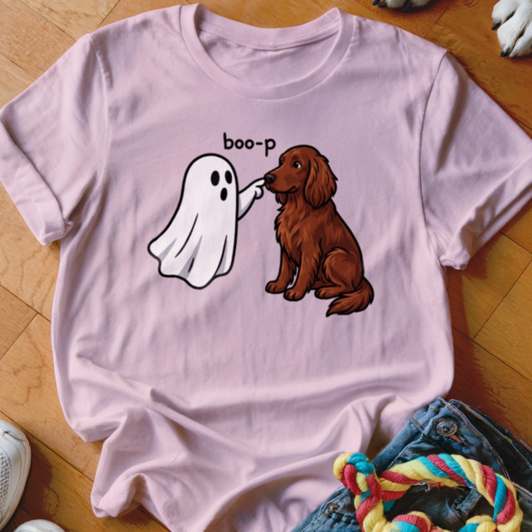 Pink t-shirt with illustration of a ghost booping a brown dog, text "boo-p".