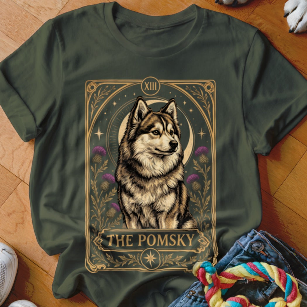 Forest green crewneck t-shirt featuring a tarot card style graphic of a husky with purple thistles and the text The Pomsky.
