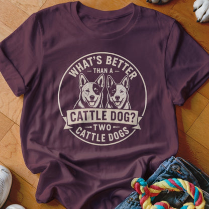 Maroon t-shirt with a circular graphic of two cattle dogs and text "What's better than a cattle dog? Two cattle dogs."