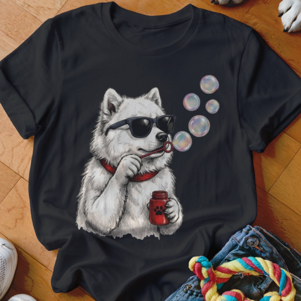 Black t-shirt featuring a graphic of a white dog wearing sunglasses and blowing bubbles.