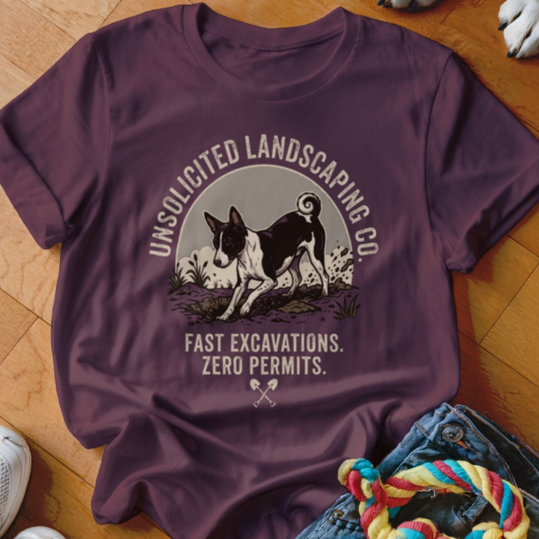 Burgundy t-shirt with dog digging, "Unsolicited Landscaping Co." and "Fast Excavations. Zero Permits."