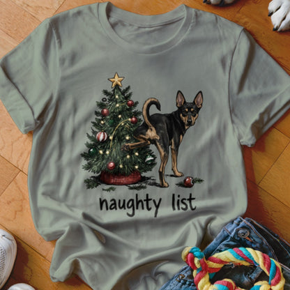Dog lifting leg on Christmas tree with text "naughty list" below.