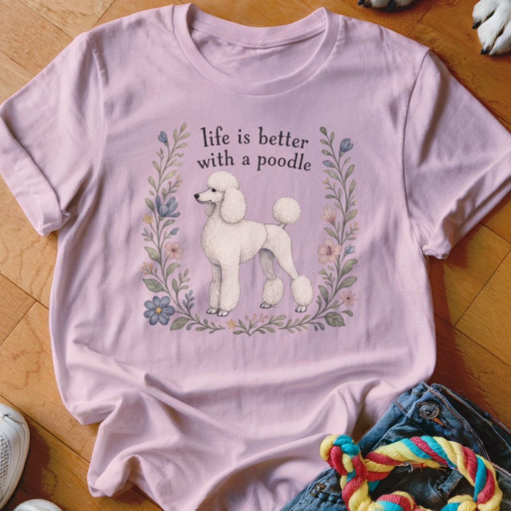 Pink t-shirt with white poodle illustration and text "life is better with a poodle".