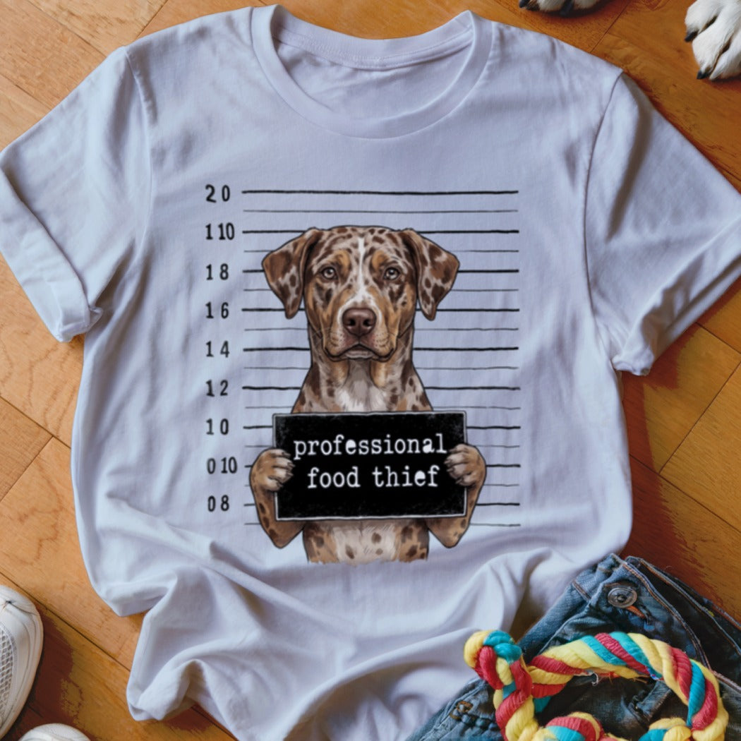 White t-shirt with a dog mugshot graphic reading "professional food thief".