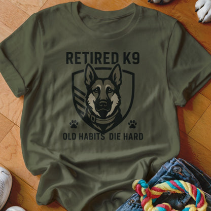 Olive green t-shirt with "RETIRED K9 OLD HABITS DIE HARD" text and German Shepherd.