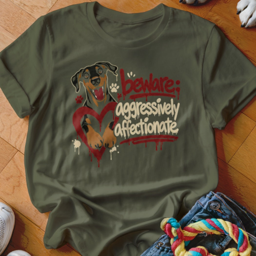 T-shirt with a dog and heart graphic that reads "beware: aggressively affectionate."