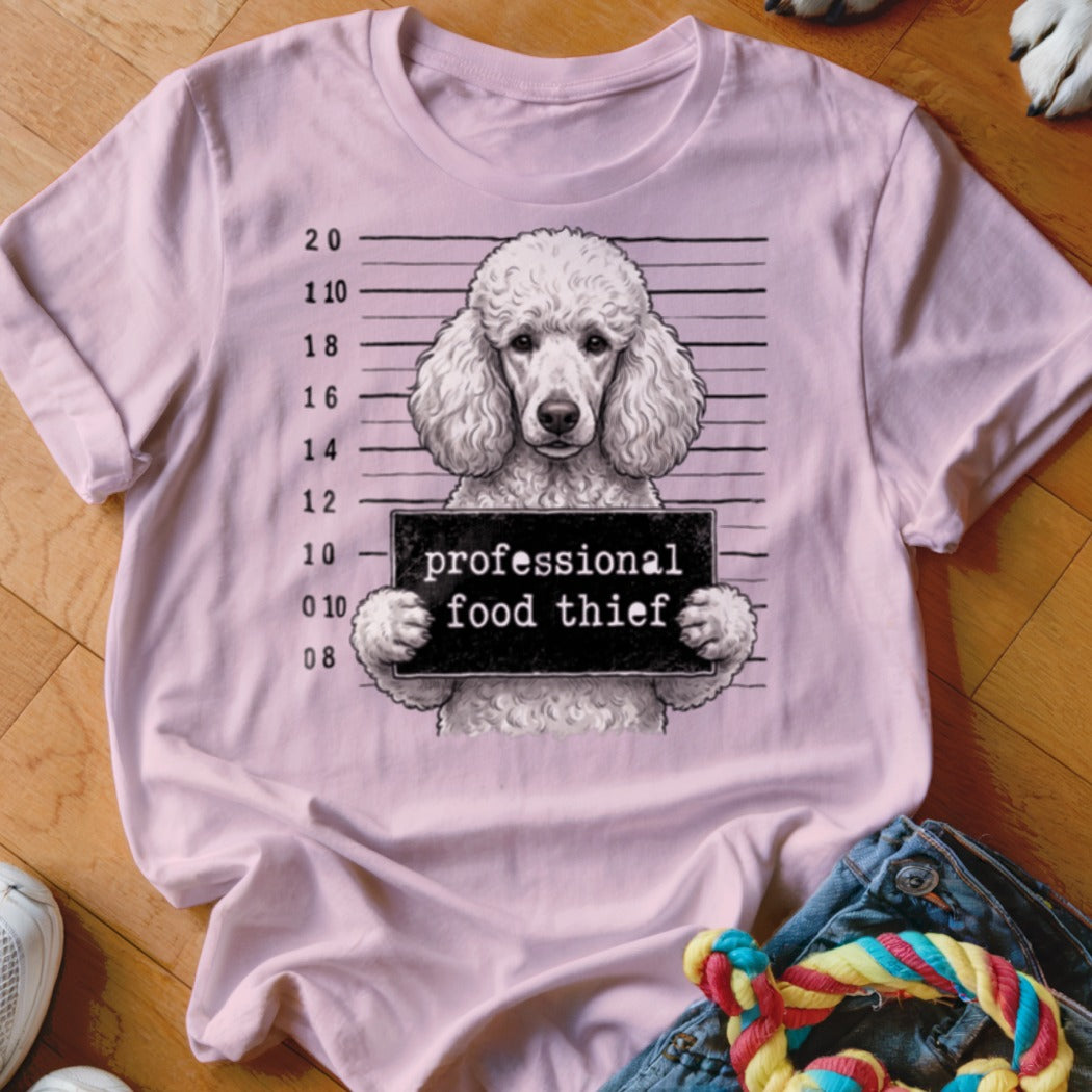 Pink t-shirt with poodle holding "professional food thief" sign.
