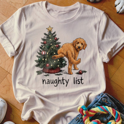 T-shirt with cartoon dog next to Christmas tree, text reads "naughty list".