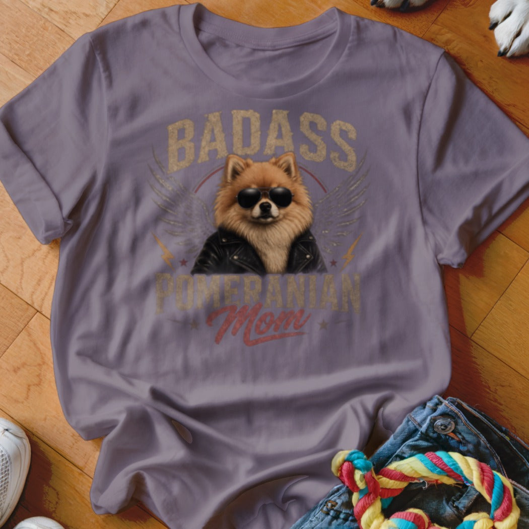 Purple t-shirt with a graphic of a Pomeranian in sunglasses and a leather jacket.