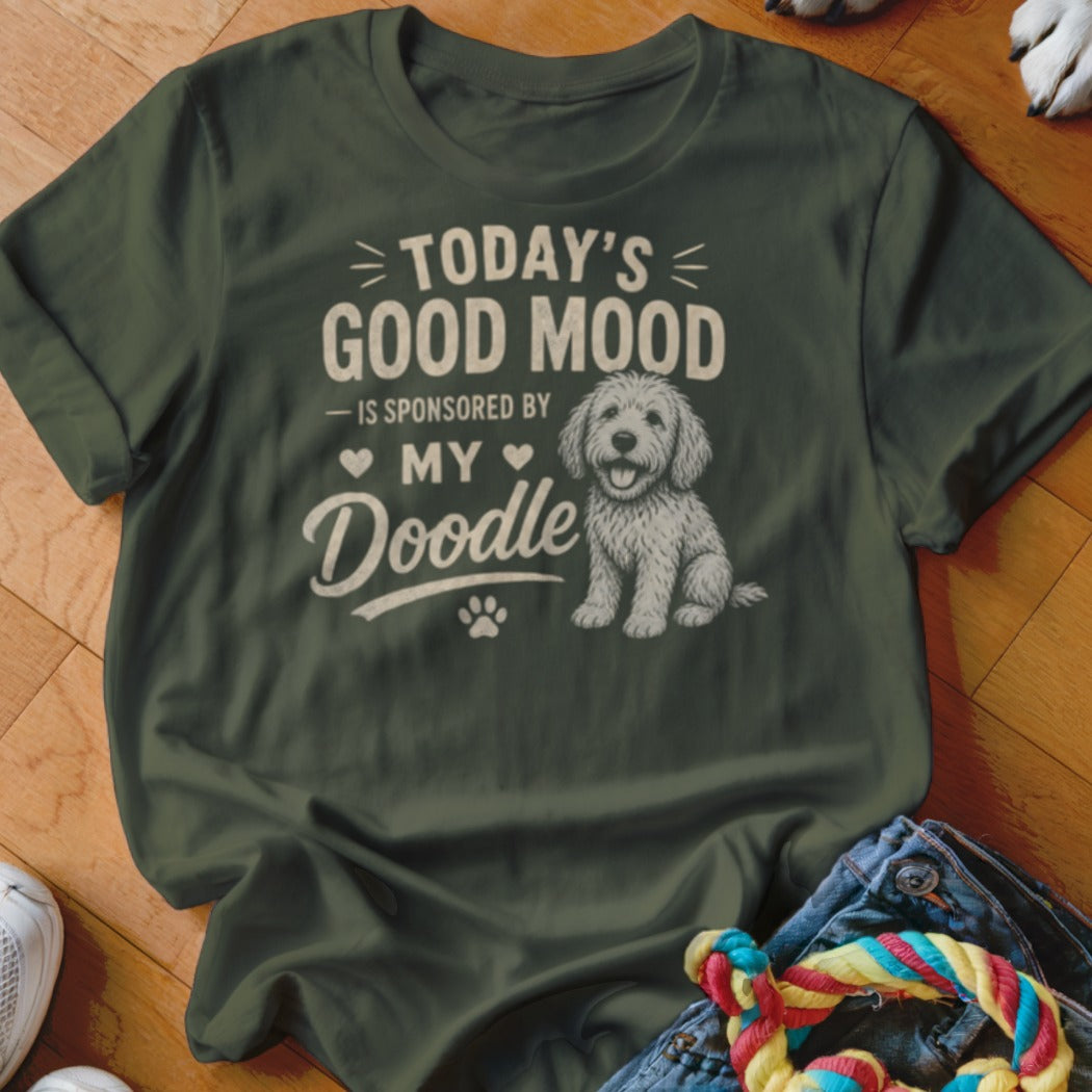 Green t-shirt with "Today's Good Mood Is Sponsored By My Doodle" and dog graphic.