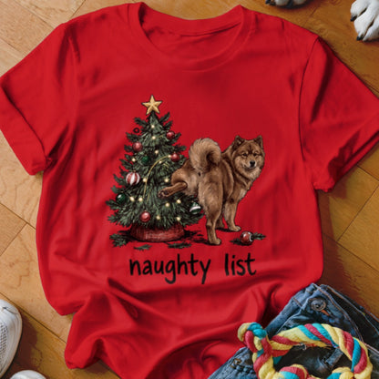 Red t-shirt with Christmas tree and dog, reads "naughty list".