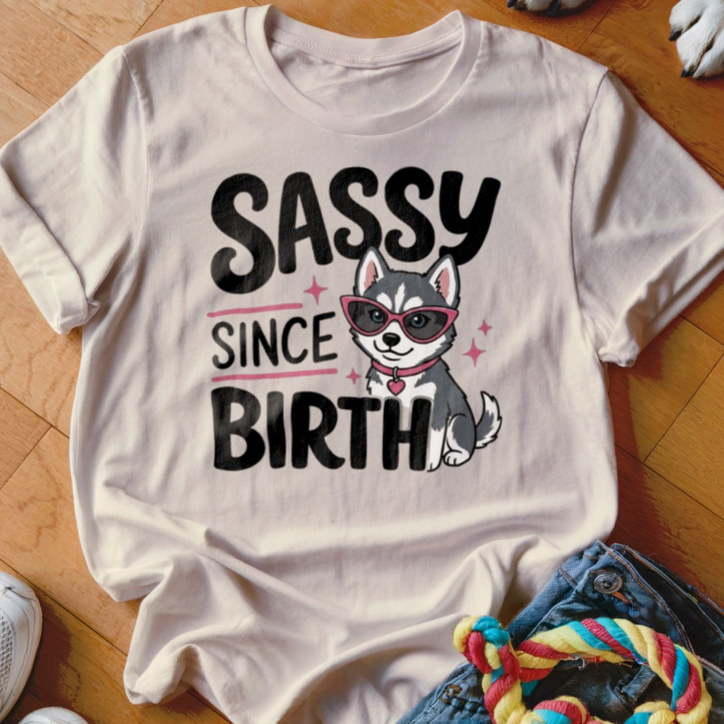 T-shirt with "Sassy Since Birth" text and a husky puppy wearing sunglasses.