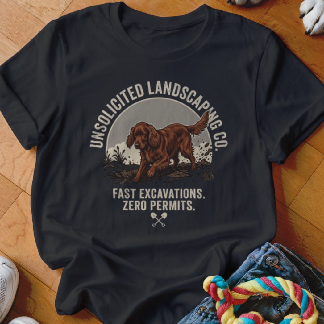 T-shirt with a dog digging and text "Unsolicited Landscaping Co. Fast Excavations. Zero Permits."