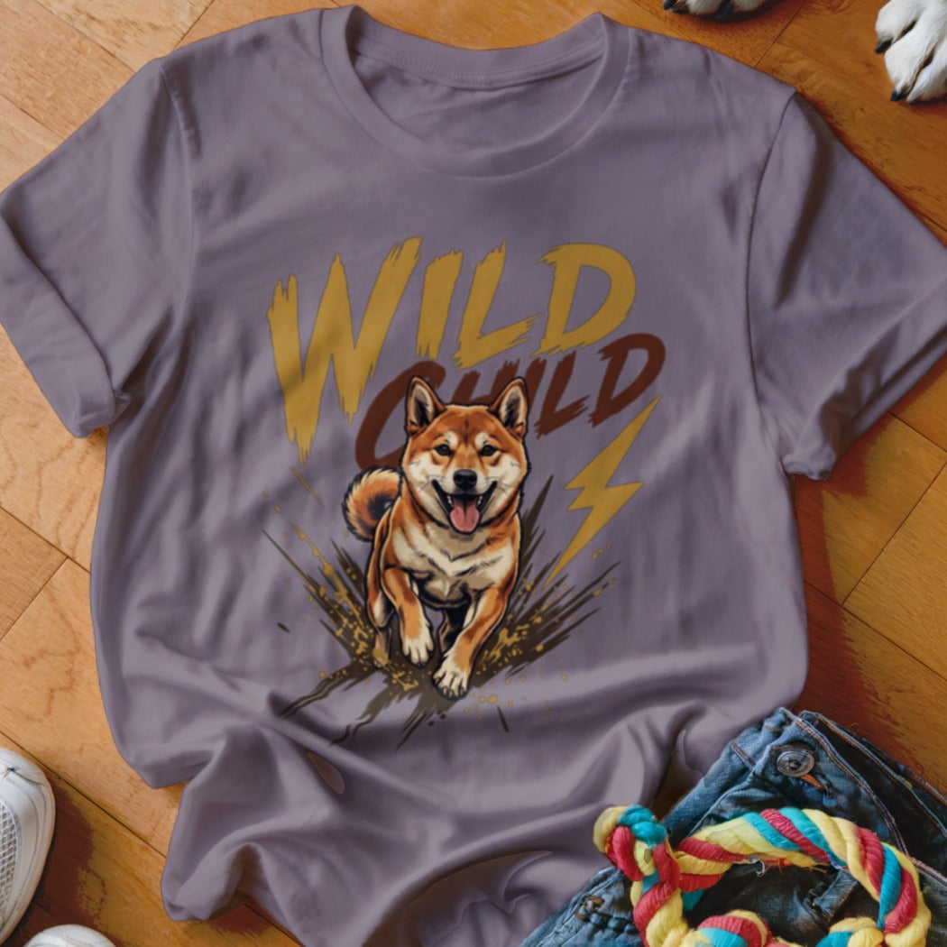 A purple t-shirt featuring a graphic of a running Shiba Inu and the text Wild Child.