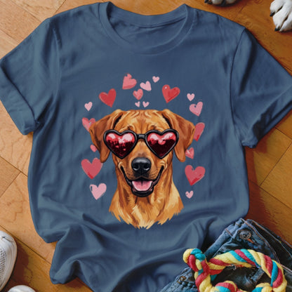 Dark blue t-shirt featuring a graphic of a golden retriever wearing heart-shaped sunglasses surrounded by floating pink hearts.