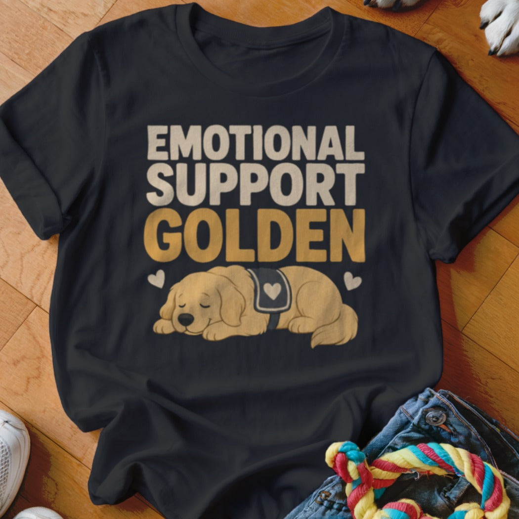 A black t-shirt printed with the text Emotional Support Golden and a sleeping golden retriever graphic.