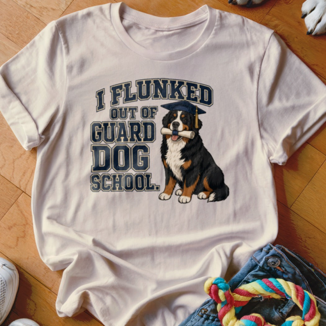 Bernese Mountain Dog wearing graduation cap, holding diploma, with "I Flunked Out of Guard Dog School" text.