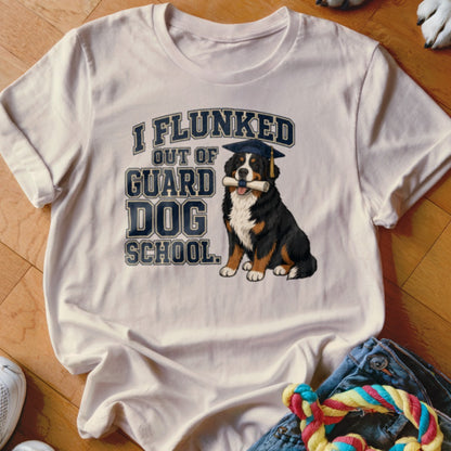 Bernese Mountain Dog wearing graduation cap, holding diploma, with "I Flunked Out of Guard Dog School" text.