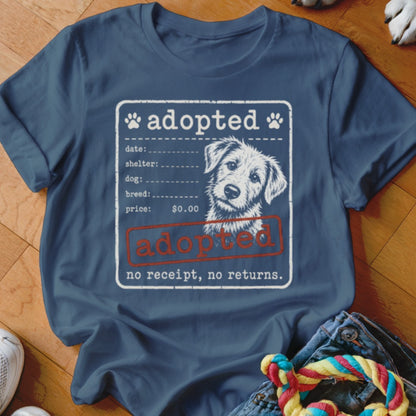 T-shirt with "adopted" design featuring a dog and adoption certificate text.