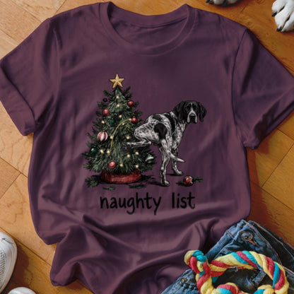 German Shorthaired Pointer by a Christmas tree with the text "naughty list".