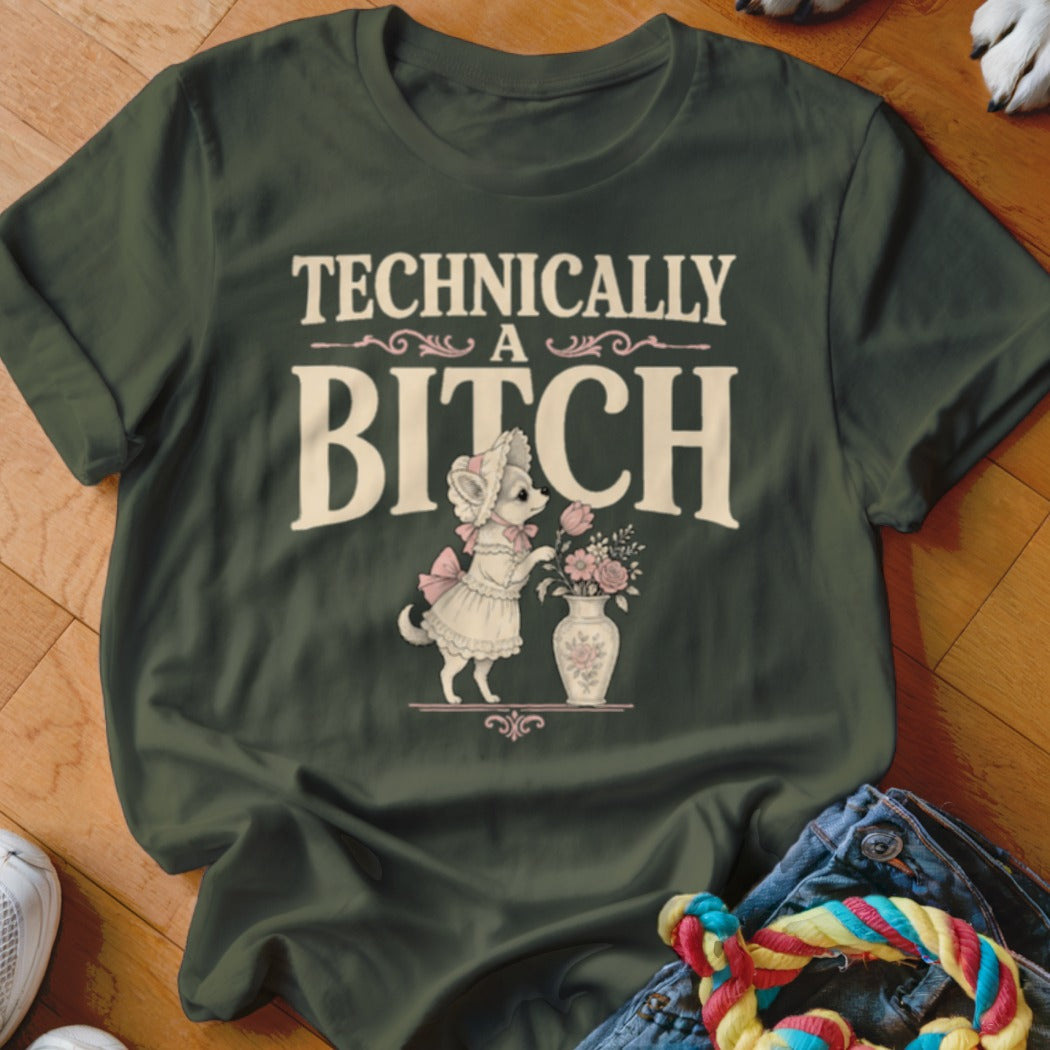 Green t-shirt with "Technically a Bitch" text and a dog in a dress smelling flowers.
