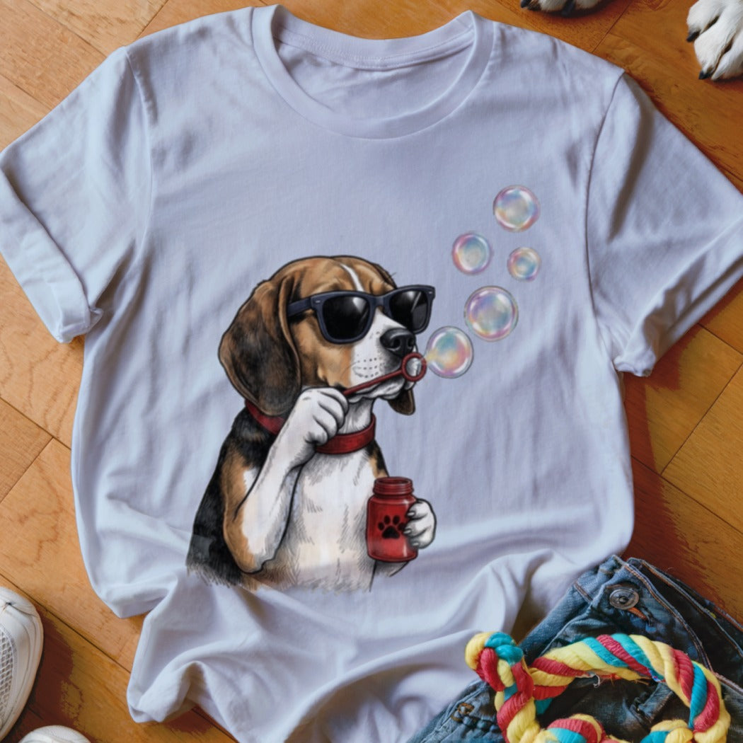 A white crewneck t-shirt featuring an illustration of a beagle wearing sunglasses and blowing soap bubbles.