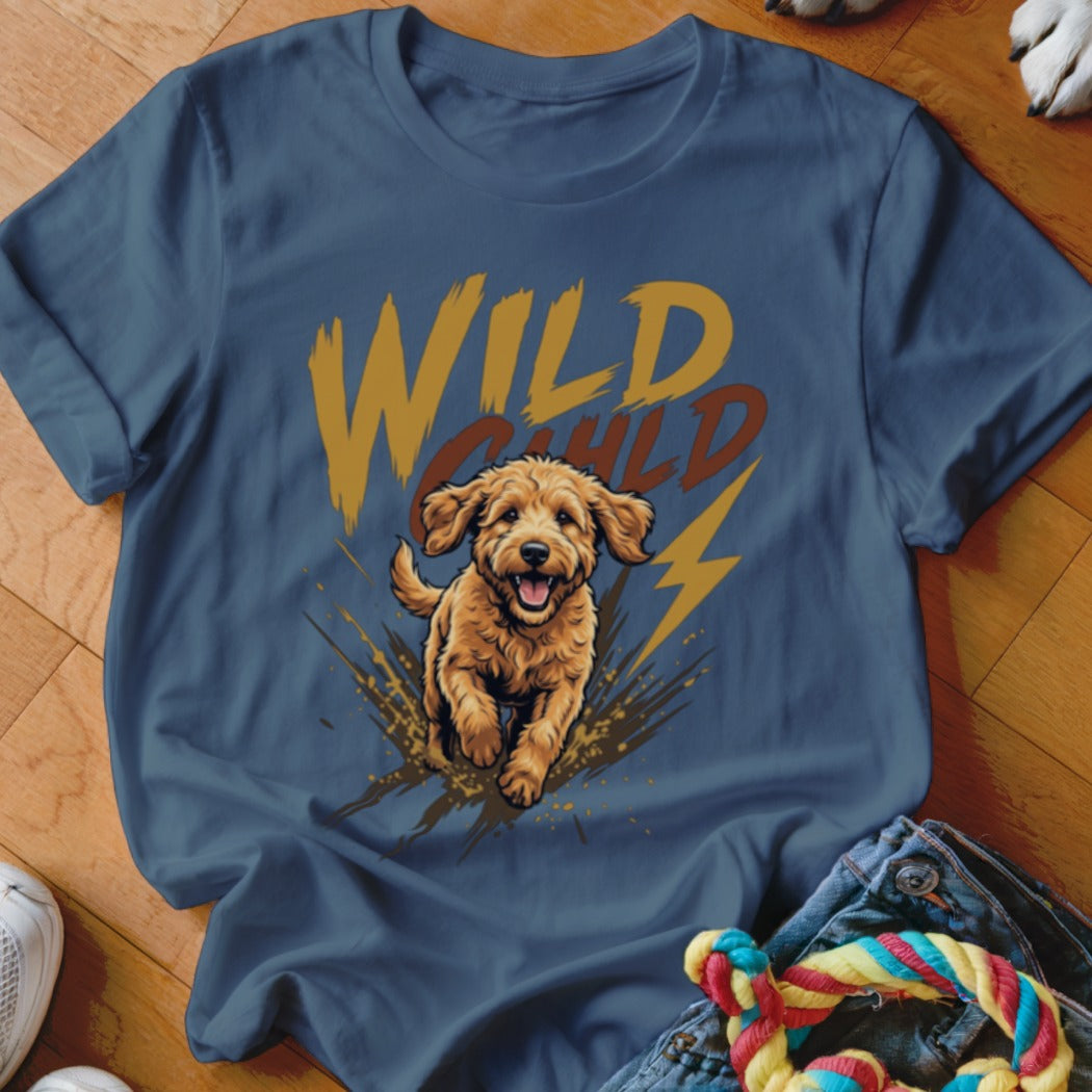 Slate blue t-shirt featuring a graphic of a golden puppy running through mud with the text Wild Child.