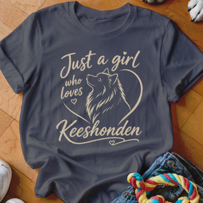 T-shirt with cream Keeshond dog silhouette inside heart and text.