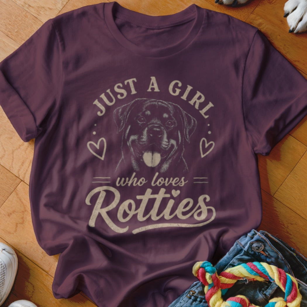 Burgundy t-shirt with Rottweiler illustration and text "JUST A GIRL who loves Rotties."