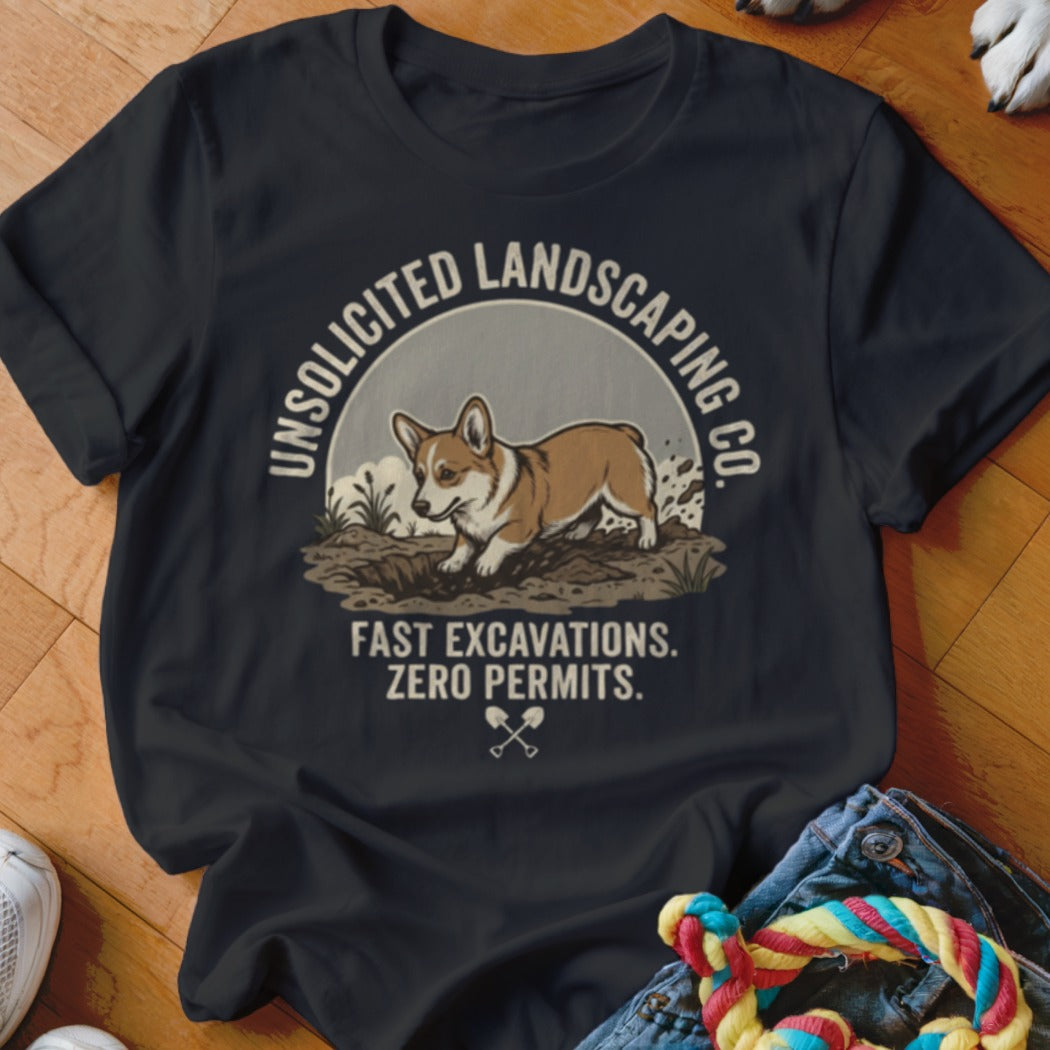 T-shirt graphic: Corgi digging dirt, "Unsolicited Landscaping Co. Fast Excavations. Zero Permits."