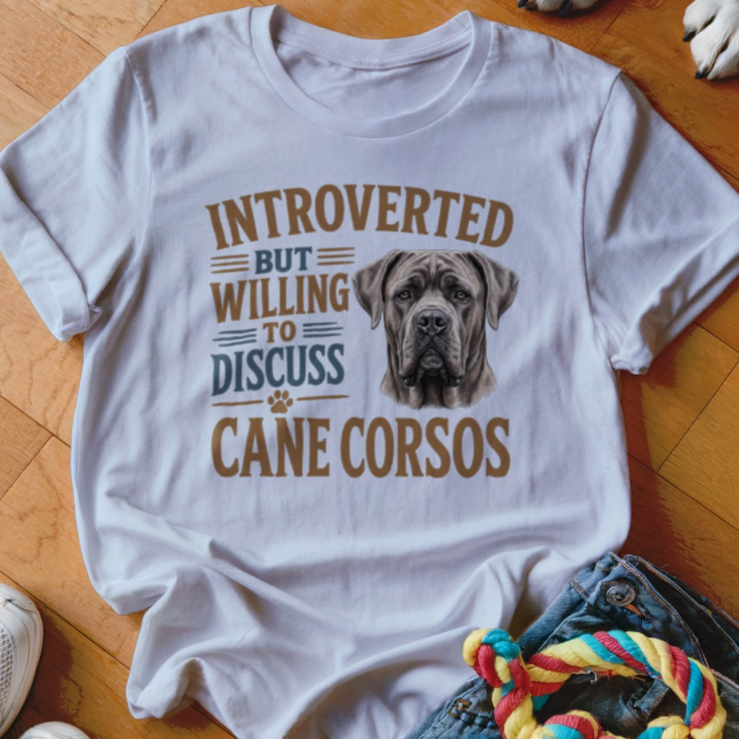 White t-shirt with graphic text "Introverted but willing to discuss Cane Corsos" and dog portrait.