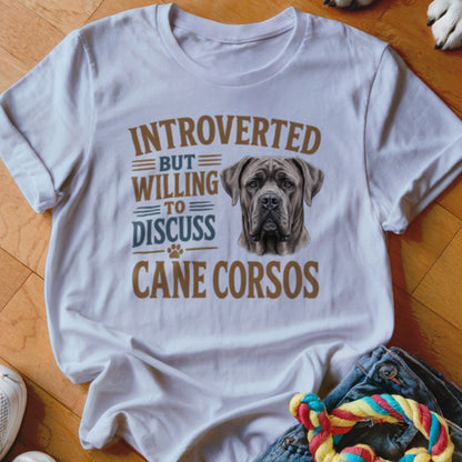White t-shirt with graphic text "Introverted but willing to discuss Cane Corsos" and dog portrait.