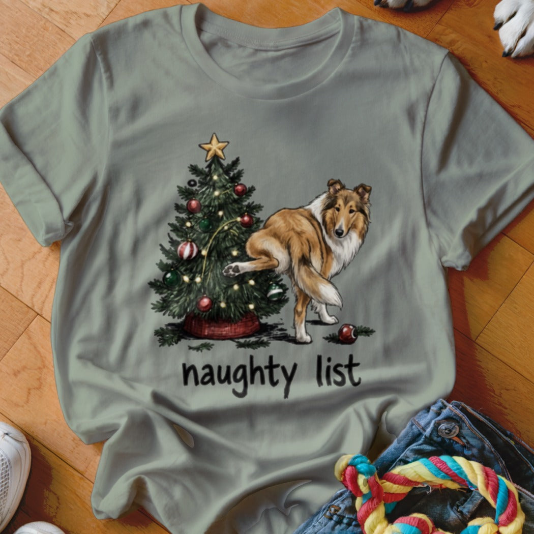 Collie dog lifting leg on Christmas tree with "naughty list" text.