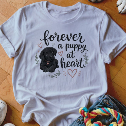 White t-shirt with black Labrador puppy and text "forever a puppy at heart."