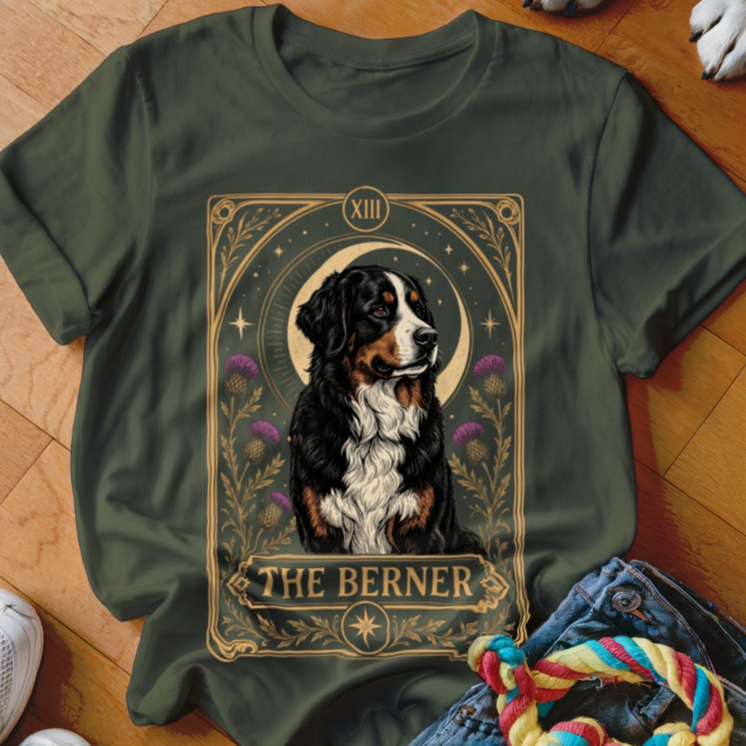 Dark green t-shirt featuring a tarot card graphic of a Bernese Mountain Dog with the text The Berner.