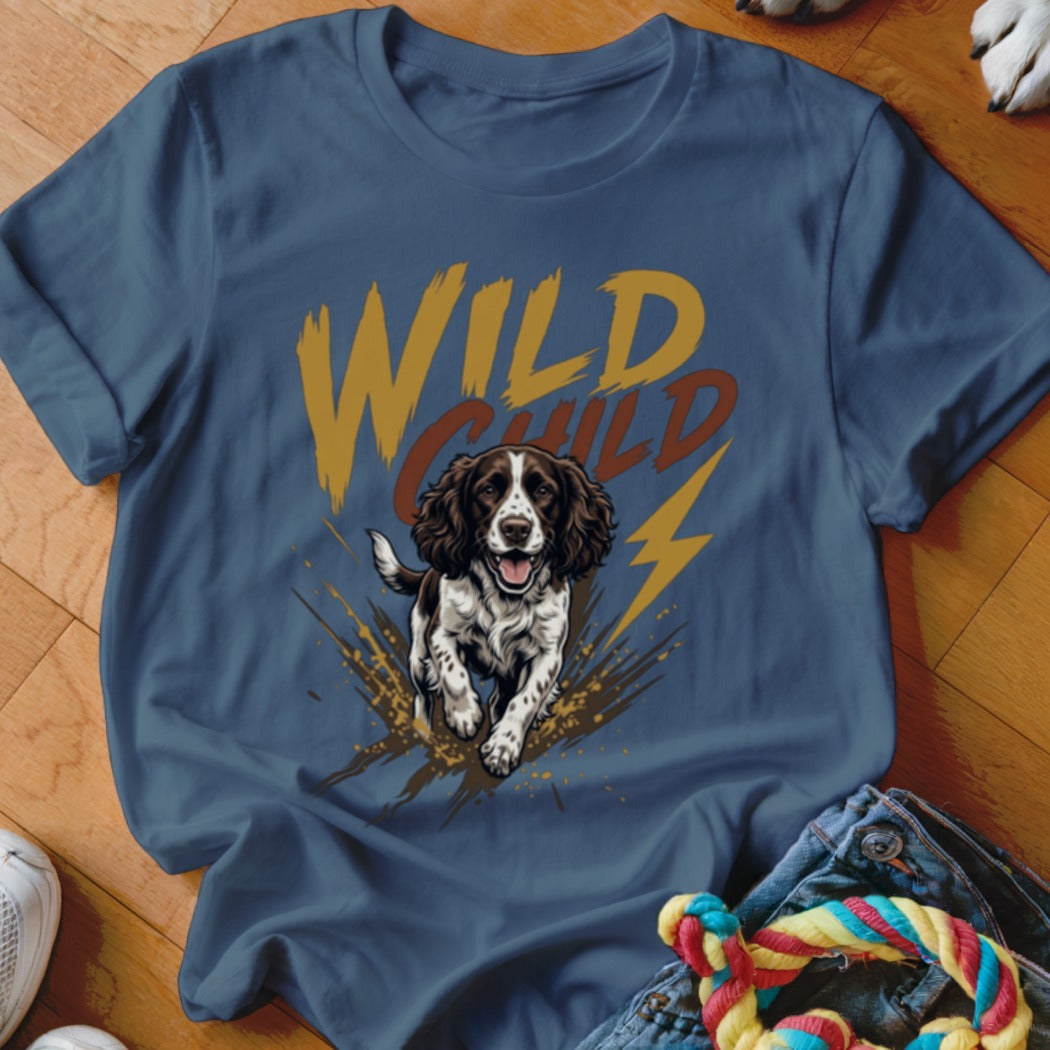 A blue t-shirt featuring a graphic of a running spaniel and the text Wild Child.