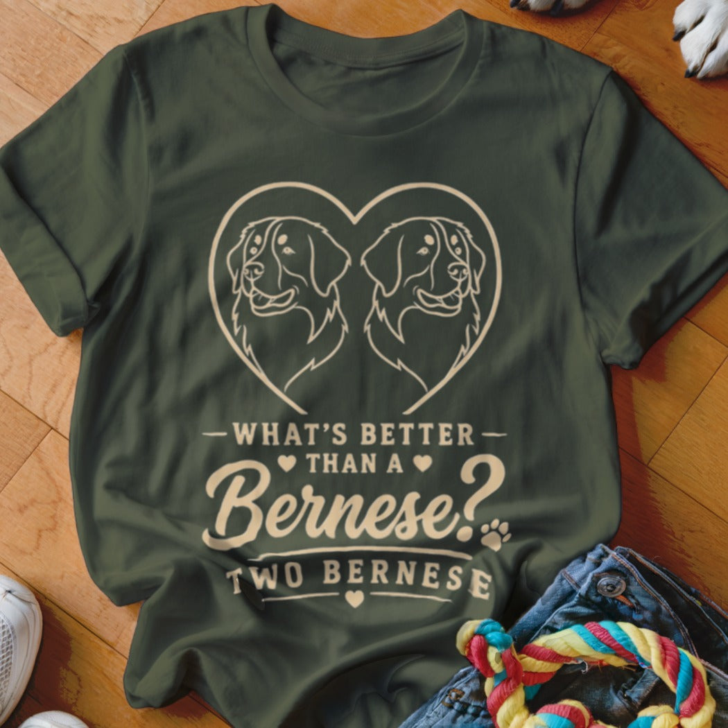 Green t-shirt with two Bernese dogs inside a heart and text about Bernese dogs.